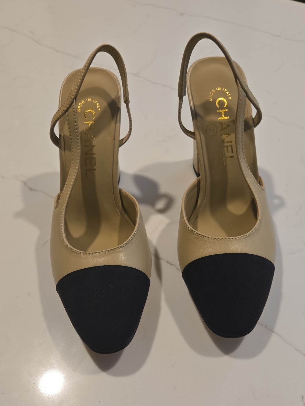 CHANEL Beige and Black Iconic Two-Tone Slingback Pumps with Cap Toe